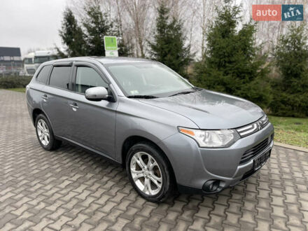 Серый Мицубиси Аутлендер, объемом двигателя 2.4 л и пробегом 240 тыс. км за 9999 $, фото 1 на Automoto.ua