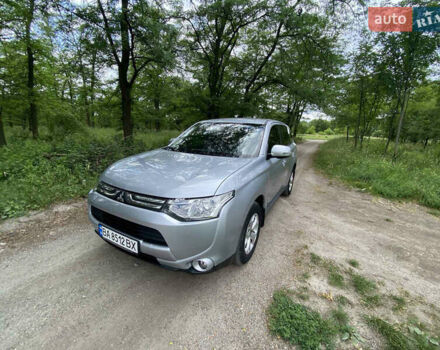 Серый Мицубиси Аутлендер, объемом двигателя 2 л и пробегом 203 тыс. км за 10999 $, фото 1 на Automoto.ua
