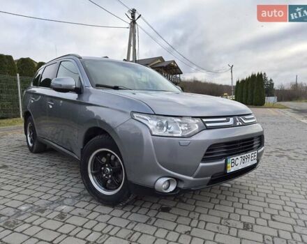 Серый Мицубиси Аутлендер, объемом двигателя 2.4 л и пробегом 228 тыс. км за 13500 $, фото 1 на Automoto.ua