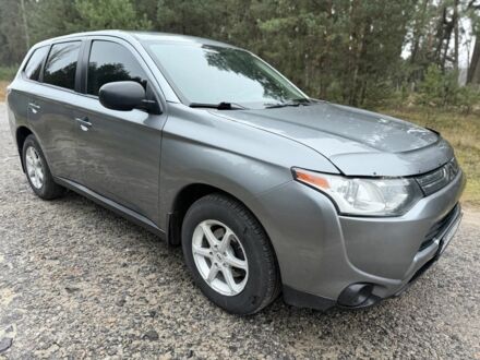 Серый Мицубиси Аутлендер, объемом двигателя 2.4 л и пробегом 150 тыс. км за 10900 $, фото 1 на Automoto.ua