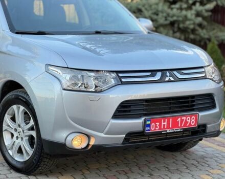 Сірий Міцубісі Аутлендер, об'ємом двигуна 2.3 л та пробігом 190 тис. км за 13800 $, фото 1 на Automoto.ua