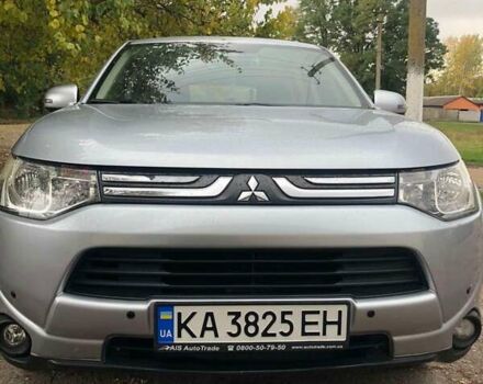 Серый Мицубиси Аутлендер, объемом двигателя 2 л и пробегом 137 тыс. км за 11000 $, фото 1 на Automoto.ua