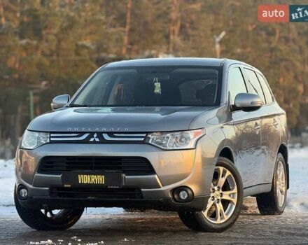Серый Мицубиси Аутлендер, объемом двигателя 2.36 л и пробегом 228 тыс. км за 9950 $, фото 1 на Automoto.ua