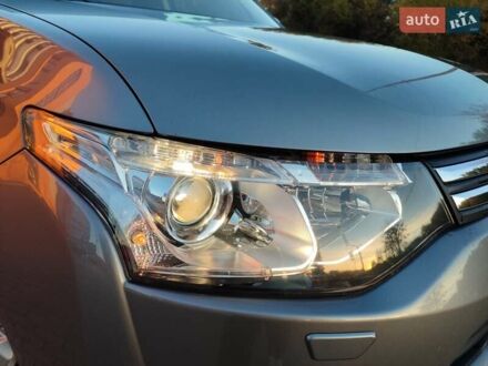 Сірий Міцубісі Аутлендер, об'ємом двигуна 2.3 л та пробігом 250 тис. км за 12999 $, фото 1 на Automoto.ua