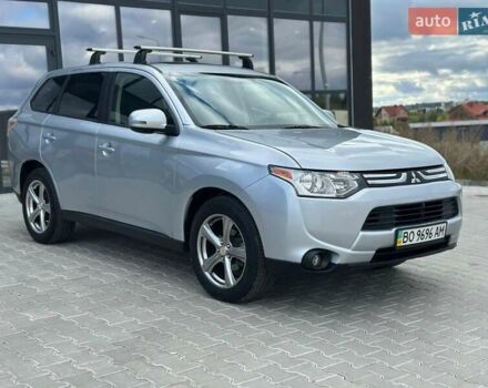 Серый Мицубиси Аутлендер, объемом двигателя 2.4 л и пробегом 228 тыс. км за 13999 $, фото 1 на Automoto.ua