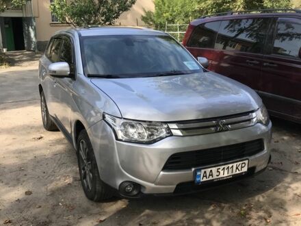Серый Мицубиси Аутлендер, объемом двигателя 2.4 л и пробегом 160 тыс. км за 13200 $, фото 1 на Automoto.ua
