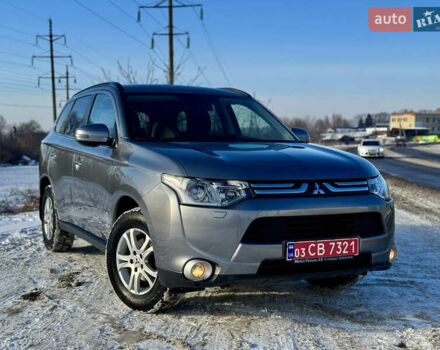 Серый Мицубиси Аутлендер, объемом двигателя 2 л и пробегом 193 тыс. км за 12750 $, фото 1 на Automoto.ua