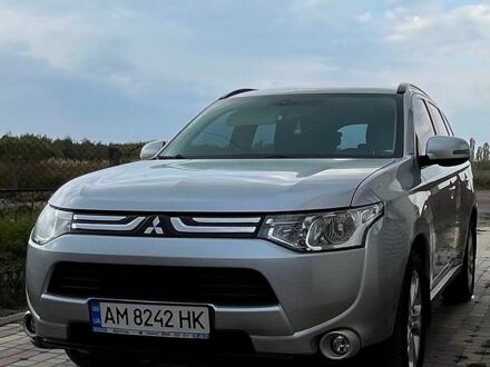 Серый Мицубиси Аутлендер, объемом двигателя 2 л и пробегом 150 тыс. км за 11800 $, фото 1 на Automoto.ua