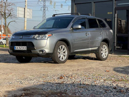 Серый Мицубиси Аутлендер, объемом двигателя 2.4 л и пробегом 209 тыс. км за 12200 $, фото 1 на Automoto.ua