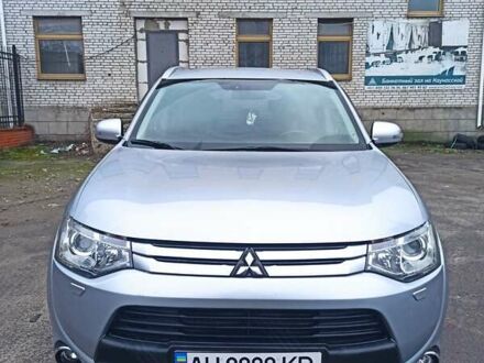 Серый Мицубиси Аутлендер, объемом двигателя 2.4 л и пробегом 197 тыс. км за 14000 $, фото 1 на Automoto.ua