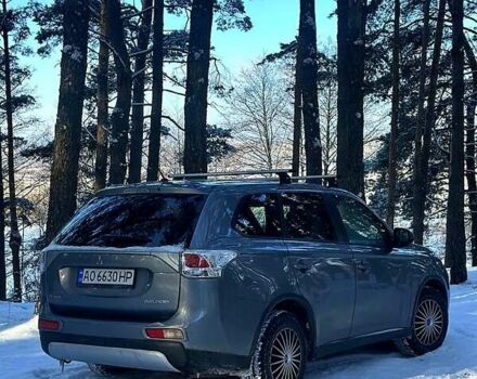 Сірий Міцубісі Аутлендер, об'ємом двигуна 2.4 л та пробігом 142 тис. км за 11250 $, фото 1 на Automoto.ua