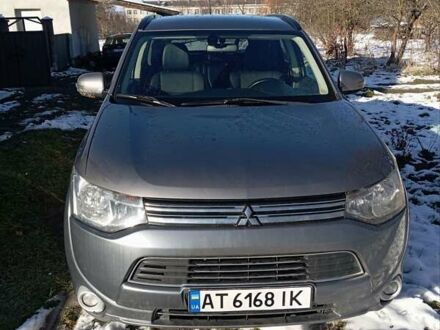 Серый Мицубиси Аутлендер, объемом двигателя 2 л и пробегом 170 тыс. км за 15200 $, фото 1 на Automoto.ua