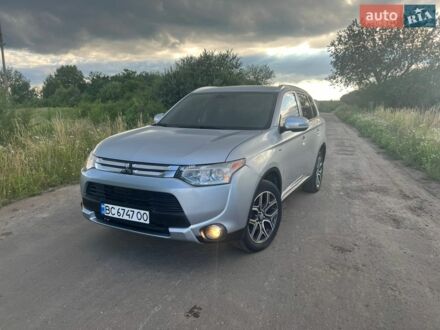 Серый Мицубиси Аутлендер, объемом двигателя 3 л и пробегом 248 тыс. км за 12900 $, фото 1 на Automoto.ua