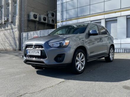 Серый Мицубиси Аутлендер, объемом двигателя 2.4 л и пробегом 250 тыс. км за 10800 $, фото 1 на Automoto.ua