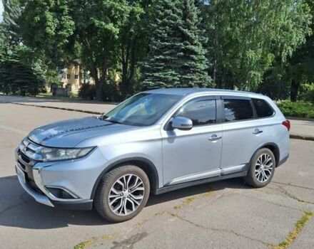 Сірий Міцубісі Аутлендер, об'ємом двигуна 2.4 л та пробігом 160 тис. км за 14200 $, фото 1 на Automoto.ua