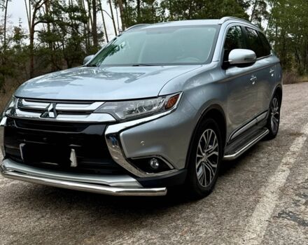 Серый Мицубиси Аутлендер, объемом двигателя 2.3 л и пробегом 55 тыс. км за 19900 $, фото 1 на Automoto.ua