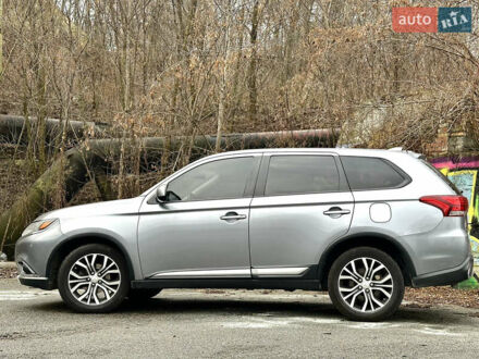 Сірий Міцубісі Аутлендер, об'ємом двигуна 2.4 л та пробігом 213 тис. км за 13999 $, фото 1 на Automoto.ua