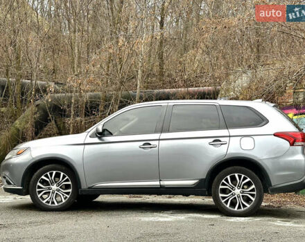 Серый Мицубиси Аутлендер, объемом двигателя 2.4 л и пробегом 213 тыс. км за 13999 $, фото 1 на Automoto.ua