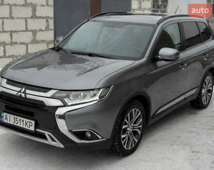 Серый Мицубиси Аутлендер, объемом двигателя 2.4 л и пробегом 203 тыс. км за 13200 $, фото 1 на Automoto.ua