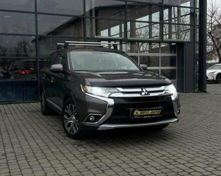 Серый Мицубиси Аутлендер, объемом двигателя 2.4 л и пробегом 160 тыс. км за 14900 $, фото 1 на Automoto.ua