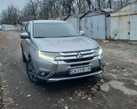 Серый Мицубиси Аутлендер, объемом двигателя 2.4 л и пробегом 250 тыс. км за 14500 $, фото 1 на Automoto.ua