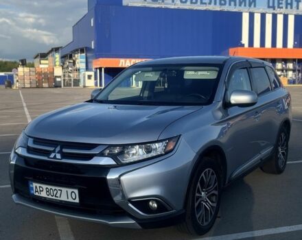 Серый Мицубиси Аутлендер, объемом двигателя 2.4 л и пробегом 178 тыс. км за 14000 $, фото 1 на Automoto.ua
