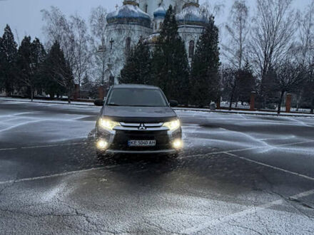 Серый Мицубиси Аутлендер, объемом двигателя 2.36 л и пробегом 205 тыс. км за 13400 $, фото 1 на Automoto.ua
