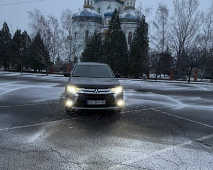 Серый Мицубиси Аутлендер, объемом двигателя 2.36 л и пробегом 205 тыс. км за 13400 $, фото 1 на Automoto.ua