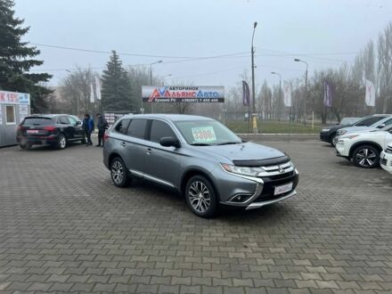 Серый Мицубиси Аутлендер, объемом двигателя 2.4 л и пробегом 205 тыс. км за 13400 $, фото 1 на Automoto.ua