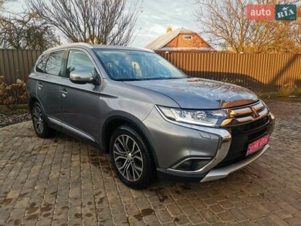 Серый Мицубиси Аутлендер, объемом двигателя 2.3 л и пробегом 130 тыс. км за 16500 $, фото 1 на Automoto.ua