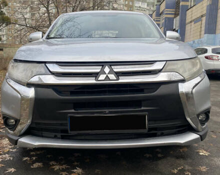 Серый Мицубиси Аутлендер, объемом двигателя 2.36 л и пробегом 120 тыс. км за 14000 $, фото 1 на Automoto.ua