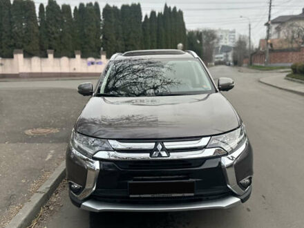 Серый Мицубиси Аутлендер, объемом двигателя 2.36 л и пробегом 48 тыс. км за 18000 $, фото 1 на Automoto.ua