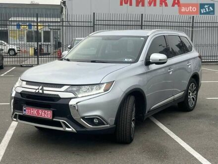 Серый Мицубиси Аутлендер, объемом двигателя 2.36 л и пробегом 120 тыс. км за 16100 $, фото 1 на Automoto.ua