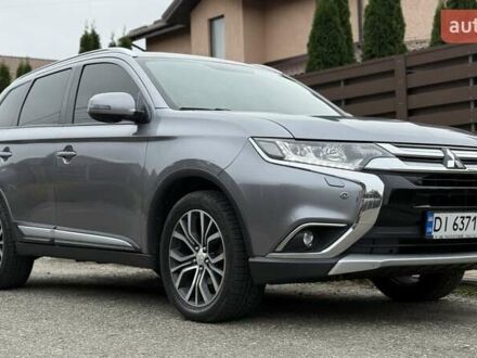 Серый Мицубиси Аутлендер, объемом двигателя 2.36 л и пробегом 153 тыс. км за 16950 $, фото 1 на Automoto.ua