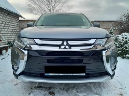 Серый Мицубиси Аутлендер, объемом двигателя 2.4 л и пробегом 77 тыс. км за 21500 $, фото 1 на Automoto.ua