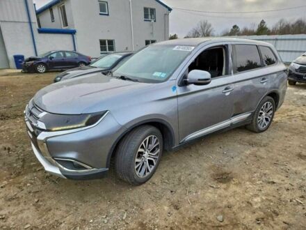 Серый Мицубиси Аутлендер, объемом двигателя 2.4 л и пробегом 152 тыс. км за 3800 $, фото 1 на Automoto.ua