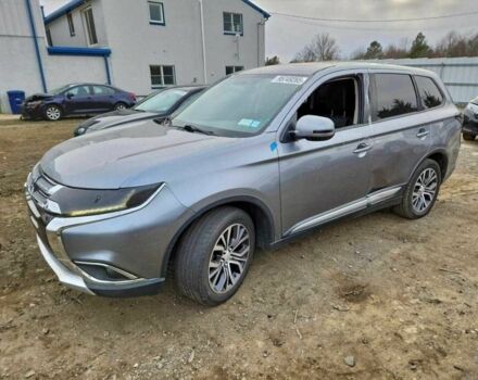 Серый Мицубиси Аутлендер, объемом двигателя 2.4 л и пробегом 152 тыс. км за 3800 $, фото 1 на Automoto.ua