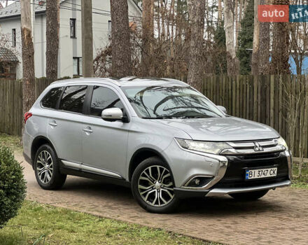 Серый Мицубиси Аутлендер, объемом двигателя 2.4 л и пробегом 189 тыс. км за 16950 $, фото 1 на Automoto.ua