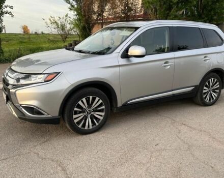 Серый Мицубиси Аутлендер, объемом двигателя 2.36 л и пробегом 110 тыс. км за 16000 $, фото 1 на Automoto.ua