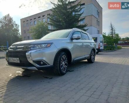Сірий Міцубісі Аутлендер, об'ємом двигуна 2.4 л та пробігом 95 тис. км за 16800 $, фото 1 на Automoto.ua