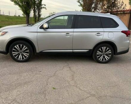 Серый Мицубиси Аутлендер, объемом двигателя 2.36 л и пробегом 102 тыс. км за 16700 $, фото 1 на Automoto.ua