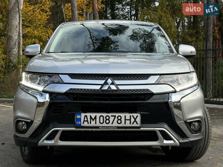 Серый Мицубиси Аутлендер, объемом двигателя 2.36 л и пробегом 130 тыс. км за 16750 $, фото 1 на Automoto.ua