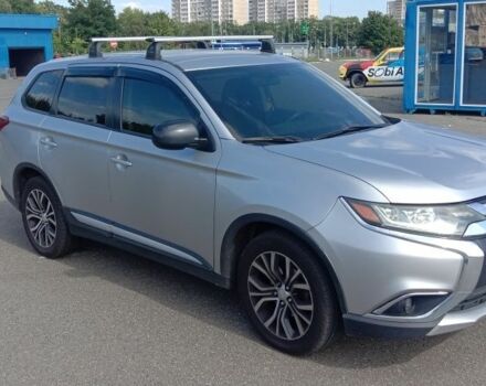 Серый Мицубиси Аутлендер, объемом двигателя 2.4 л и пробегом 100 тыс. км за 17700 $, фото 1 на Automoto.ua