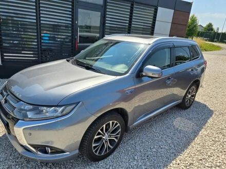 Серый Мицубиси Аутлендер, объемом двигателя 2.4 л и пробегом 89 тыс. км за 9900 $, фото 1 на Automoto.ua