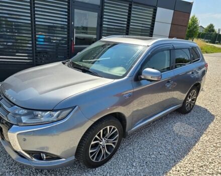 Серый Мицубиси Аутлендер, объемом двигателя 2.4 л и пробегом 89 тыс. км за 9900 $, фото 1 на Automoto.ua