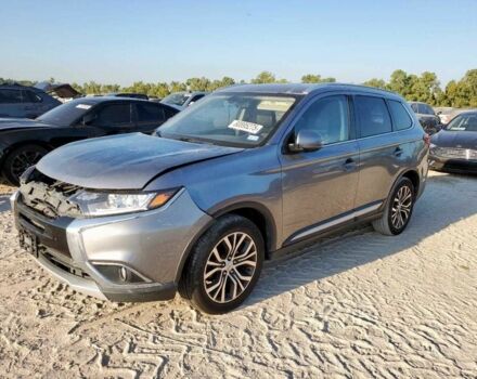 Серый Мицубиси Аутлендер, объемом двигателя 2.4 л и пробегом 150 тыс. км за 2800 $, фото 1 на Automoto.ua