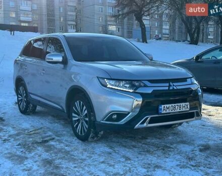 Серый Мицубиси Аутлендер, объемом двигателя 2.36 л и пробегом 132 тыс. км за 16450 $, фото 1 на Automoto.ua