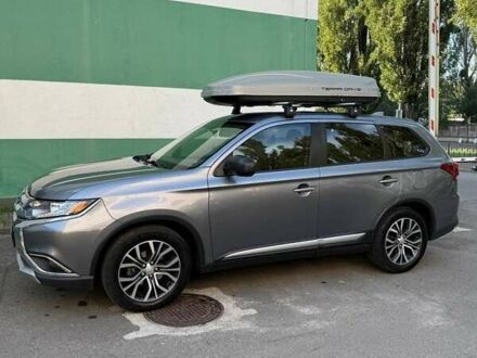 Серый Мицубиси Аутлендер, объемом двигателя 2.36 л и пробегом 186 тыс. км за 15500 $, фото 1 на Automoto.ua