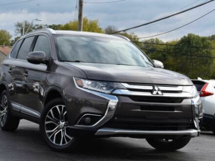 Серый Мицубиси Аутлендер, объемом двигателя 2.4 л и пробегом 50 тыс. км за 7000 $, фото 1 на Automoto.ua