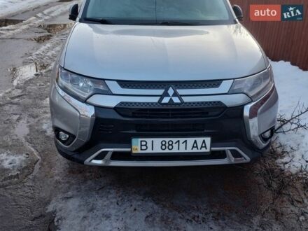 Серый Мицубиси Аутлендер, объемом двигателя 3 л и пробегом 160 тыс. км за 18200 $, фото 1 на Automoto.ua